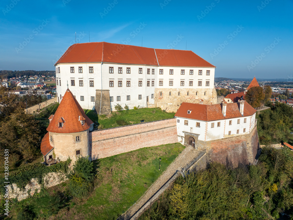 Aerial view of Ptuj castle on a hilltop above the old town, Drava river in Slovenia. Aerial view of Ptuj castle on a hilltop above the old town, Drava river in Slovenia.