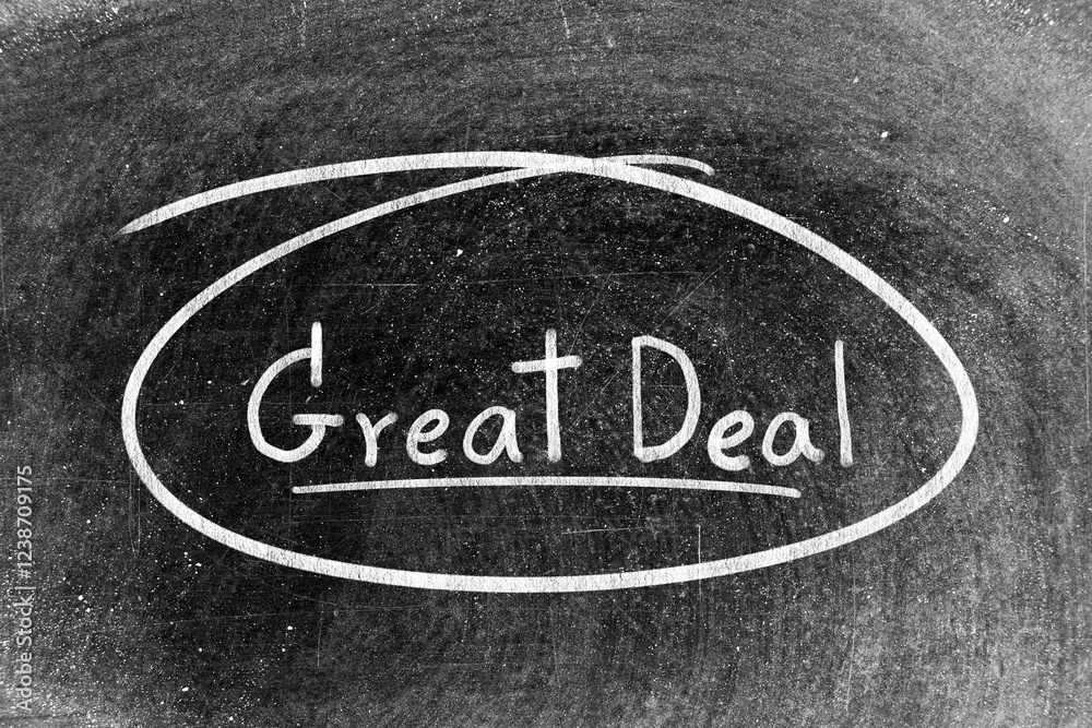 White chalk hand writing in word great deal and circle shape on blackboard background White chalk hand writing in word great deal and circle shape on blackboard background