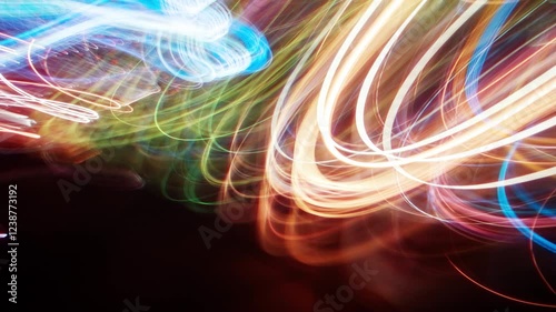 Timelapse flickering light trails. Blurry colorful city streak lights glowing at night, long exposure transformations bright multicolored street illumination. Curved lines change with strobe effect