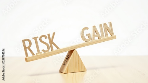 Wooden Seesaw with Risk and Gain Text in Closeup photo