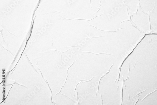 Close-up texture of white paper with folds.