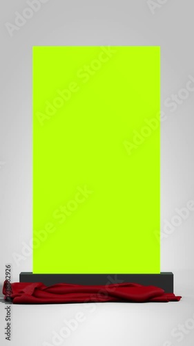 a red curtain falling to reveal a green background for embedding the image or video of your choice - 3D rendering