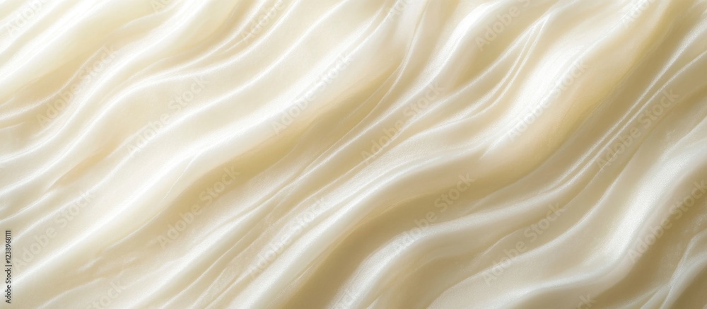 Fototapeta premium Textured satin fabric background with soft waves in light cream color ideal for design projects and textiles Copy Space