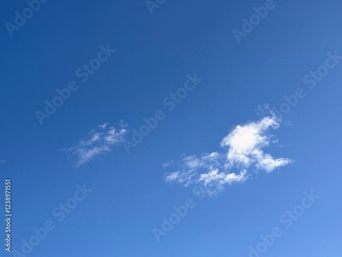 Full frame of pretty blue sky with unusual scudding cloud formation