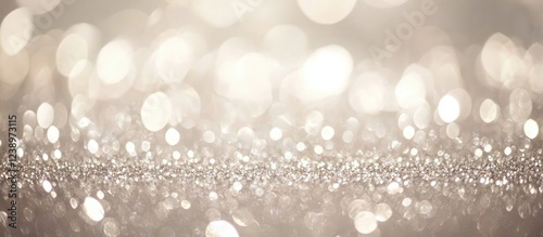 Soft blurred background with bokeh effect and sparkling light particles texture suitable for festive and elegant design Copy Space photo