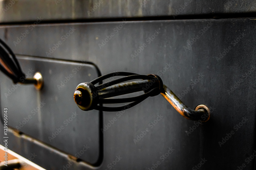 close-up of old rusty black and metal handle on grill lifestyles reunion barbeque family rustic weathered bbq background close-up of old rusty black and metal handle on grill lifestyles reunion barbeque family rustic weathered bbq background
