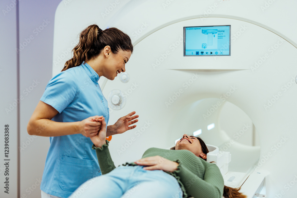 © Dragana Gordic - Healthcare Professional Assisting Patient During MRI Scan Procedure