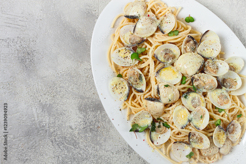 spaghetti with vongole clams, in cream sauce, carbonara, on a white plate, homemade, top view, no people, spaghetti with vongole clams, in cream sauce, carbonara, on a white plate, homemade, top view, no people,