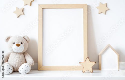 Blank poster mockup in wooden frame, teddy bear and decorative wooden stars on dresser in white nursery