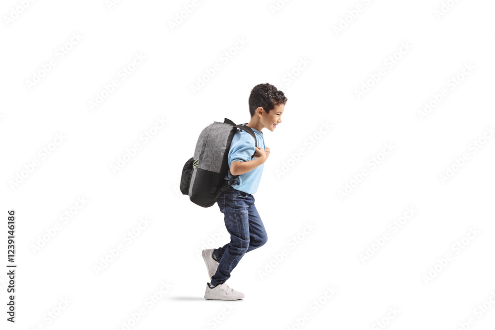 Full length prodile shot of a schoolboy running with a backpack Full length prodile shot of a schoolboy running with a backpack
