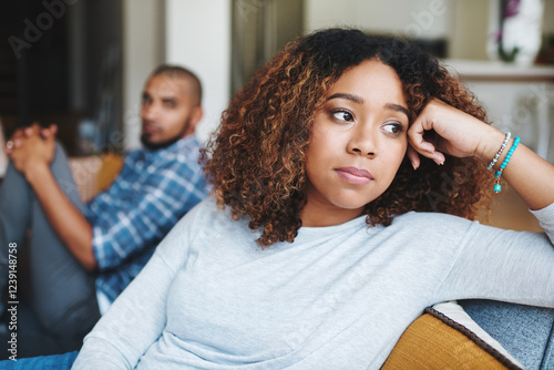 Frustrated couple, ignore and fight with argument on sofa for disagreement, conflict or living room dispute at home. Upset woman, man or separation with affair for breakup or toxic relationship
