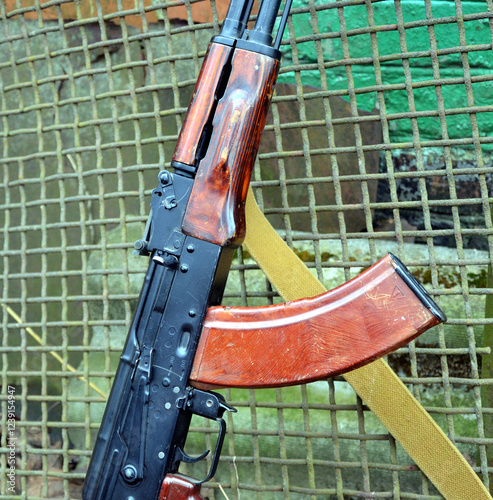 AKM. machine gun with cartridges
 photo