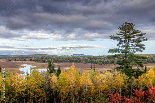 landscape with river and clouds in autumn