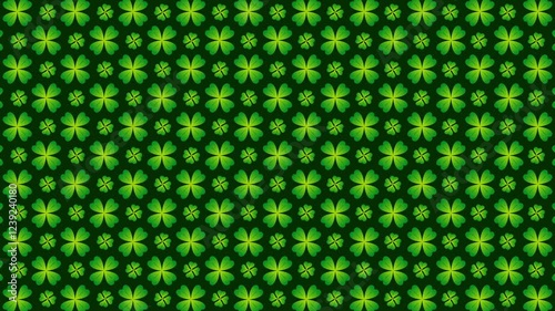 A seamless green clover pattern transforming through rotation, shifting, expanding, and contracting movements. Features two types of pattern changes in a single loop