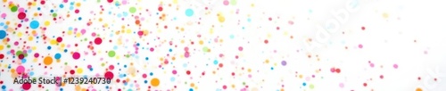 White background densely covered in tiny rainbow confetti , dense, small