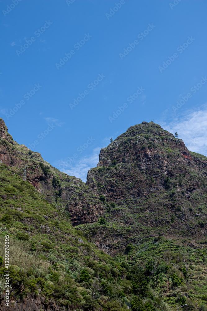 Mountain and a blue sky with clouds, Madeira, Portugal Mountain and a blue sky with clouds, Madeira, Portugal