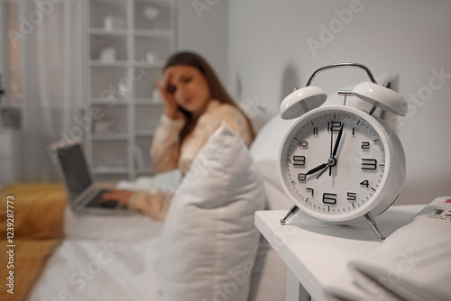 Alarm clock on table of you...