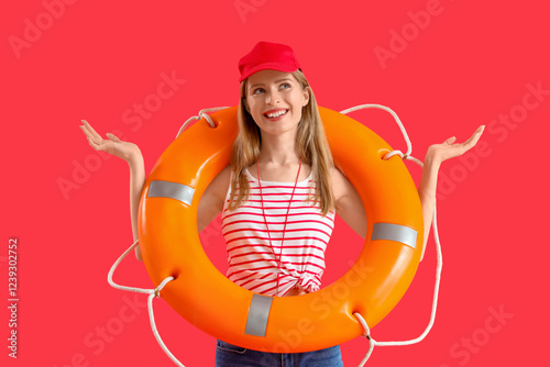 Young female lifeguard in c...