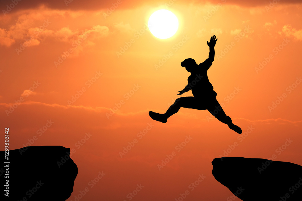 Leap of Faith: Silhouette of a person making a daring jump between two cliffs at sunset, symbolizing courage, risk-taking, and overcoming challenges. Leap of Faith: Silhouette of a person making a daring jump between two cliffs at sunset, symbolizing courage, risk-taking, and overcoming challenges.