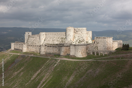Syria Krak des Chevaliers castle on a cloudy summer day