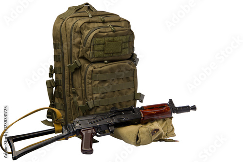 Military backpack and machine gun isolated on white background photo