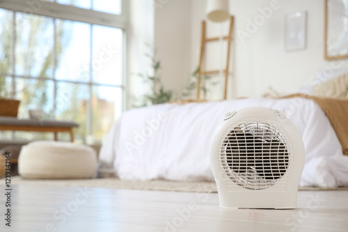 Electric fan heater on floo...