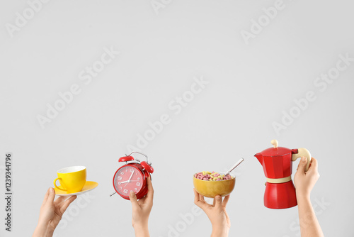 Female hands with alarm clo...