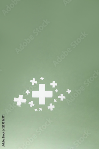 Glowing Plus Signs in Serene Green Background, Space for Text