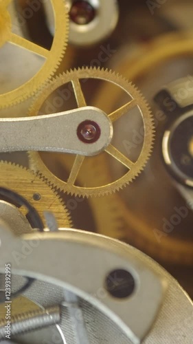 Cogwheels inside clockwork. Close-up. Concept Eternity, Teamwork , Idea Technology. Tick-Tick Sound