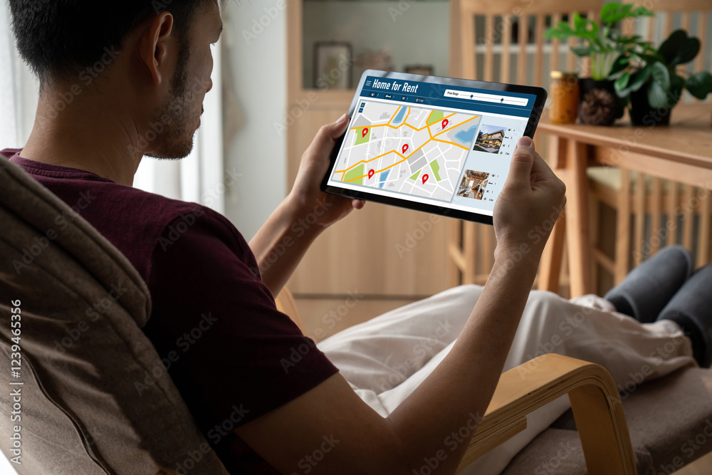 Online real estate rental search snugly on computer. House home or apartment rental website online. Online real estate rental search snugly on computer. House home or apartment rental website online.