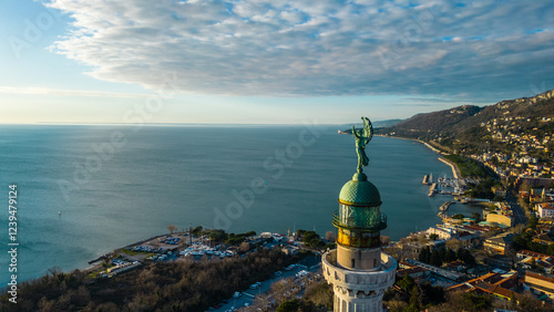 Photos A breathtaking aerial drone view of the Faro della Vittoria (Victory Lighthouse) in Trieste, Italy