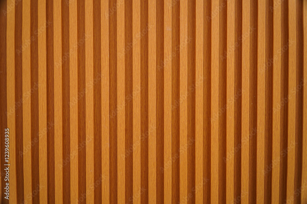 Obraz premium Close-up view of a wooden surface with vertical lines, showcasing the texture and detail of the wood. Textured Wooden Wall Paneling: A Detailed Close-up