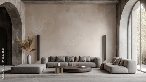 A luxurious living room with soft brown and beige tones, featuring modern gray lounge furniture and an art-ready empty microcement background.
