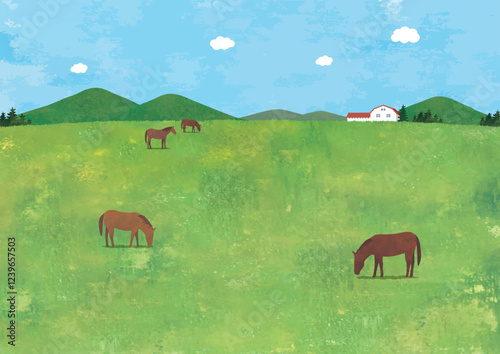 広い草原に馬が放牧されている風景