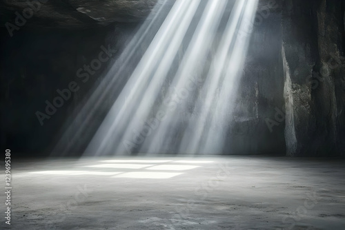 Light Beams Illuminate a Dark, Grungy Room with a Concrete Floor