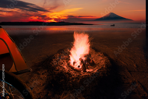 Sunset beach campfire and camping.