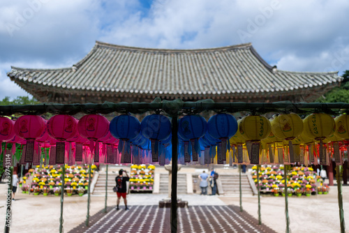 Canvas Print Vibrant lanterns illuminate the serene beauty of a traditional Korean temple, creating a festive atmosphere