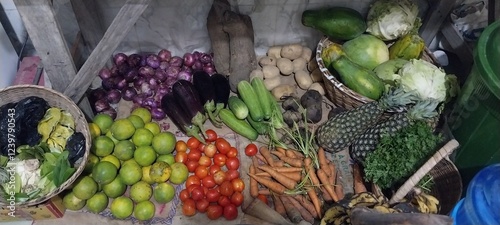 Colorful array of fruits and vegetables in marketplace