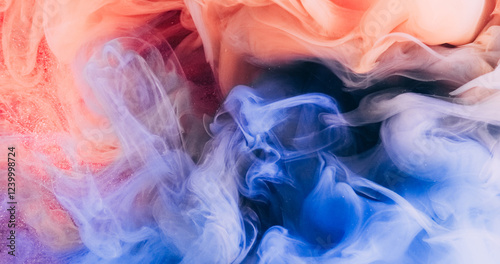Color smoke. Abstract background. Blur blue coral orange paint water explosion fume flow floating shimmering glitter particles art texture.