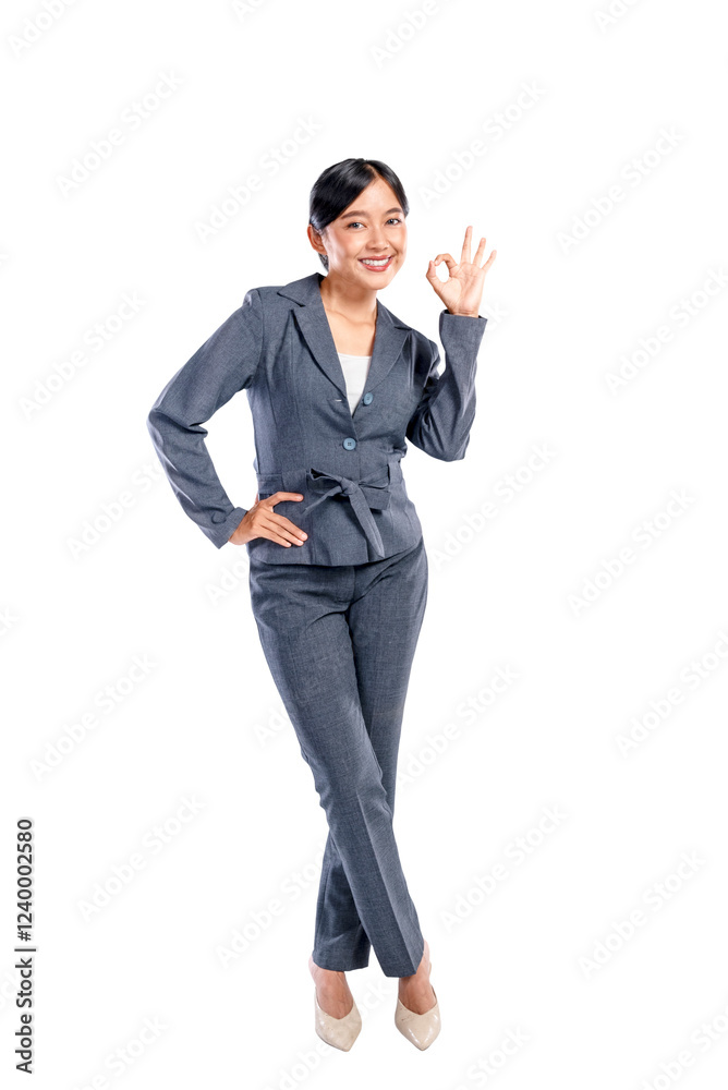 Portrait of an Asian businesswoman standing with confidence and showing an ok sign gesture isolated over a white background. Concept of business, entrepreneur, and successful Portrait of an Asian businesswoman standing with confidence and showing an ok sign gesture isolated over a white background. Concept of business, entrepreneur, and successful