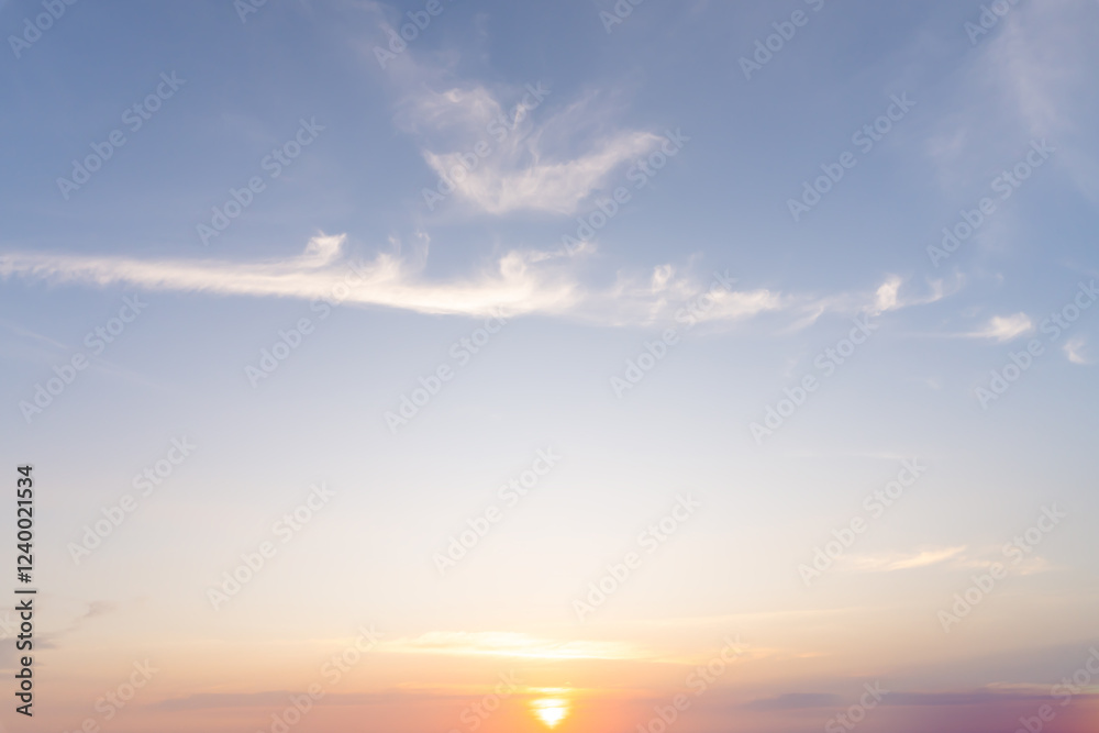Beautiful morning or evening blue and orange sky with cloudy while sunsets or sunrises taken at the sea used as natural blackground texture Beautiful morning or evening blue and orange sky with cloudy while sunsets or sunrises taken at the sea used as natural blackground texture