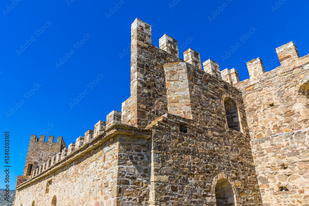 Towers and walls of an ancient stone Genoese fortress in Sudak on the Black Sea coast in Crimea, Russia. Here is the museum-reserve Towers and walls of an ancient stone Genoese fortress in Sudak on the Black Sea coast in Crimea, Russia. Here is the museum-reserve
