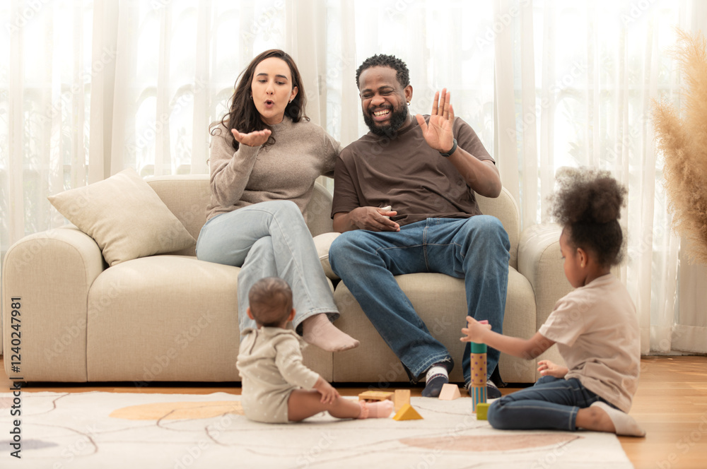 Parents and children relax during their holiday at home Parents and children relax during their holiday at home