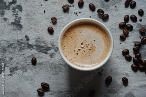 Warm cup of coffee beside roasted beans in a cozy indoor setting with natural...