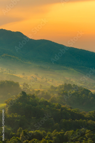 Vertical Horizon Sunset mountain range beautiful landscape mist foggy sunrise beam. Golden sky Mountain landscape mountain. Vertical Amazing Landscape cloud sky on sunrise. Gold sunlight heaven scene