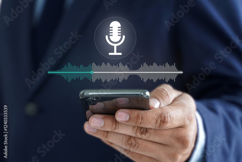 Businessman voice recording the conversation via smartphone with customers, telemarketing, consulting, voice assistance access to information and applications, write a message and send a message. photo