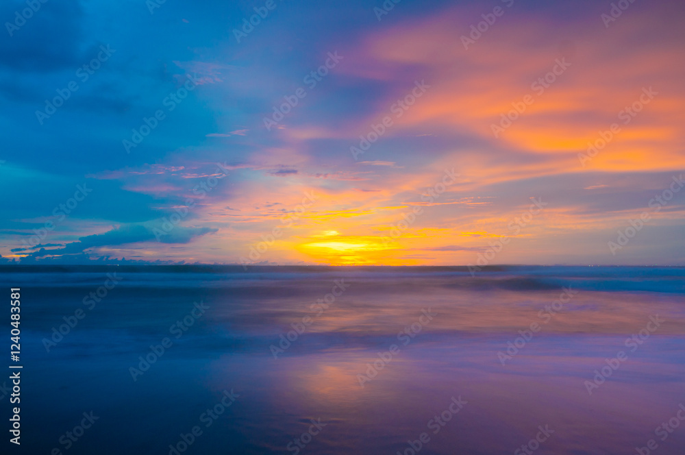 Fototapeta premium sunset on the sea with blue sky