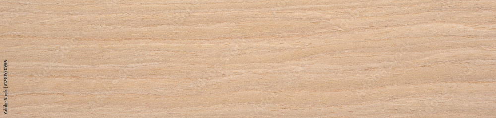 Warm golden hues blend with the gentle textures of ash wood in this finely sanded veneer