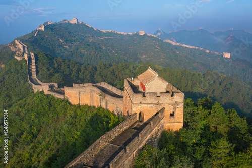 Aerial view of jinshanling great wall amidst majestic mountains and lush greenery, Luanping County, China. photo