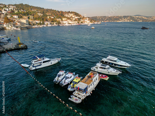 Aerial view of boats on the serene Bosphorus in autumn, Bebek, Istanbul, Turkey. photo